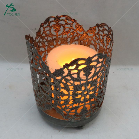 Ornate single metal candle holder for home decoration