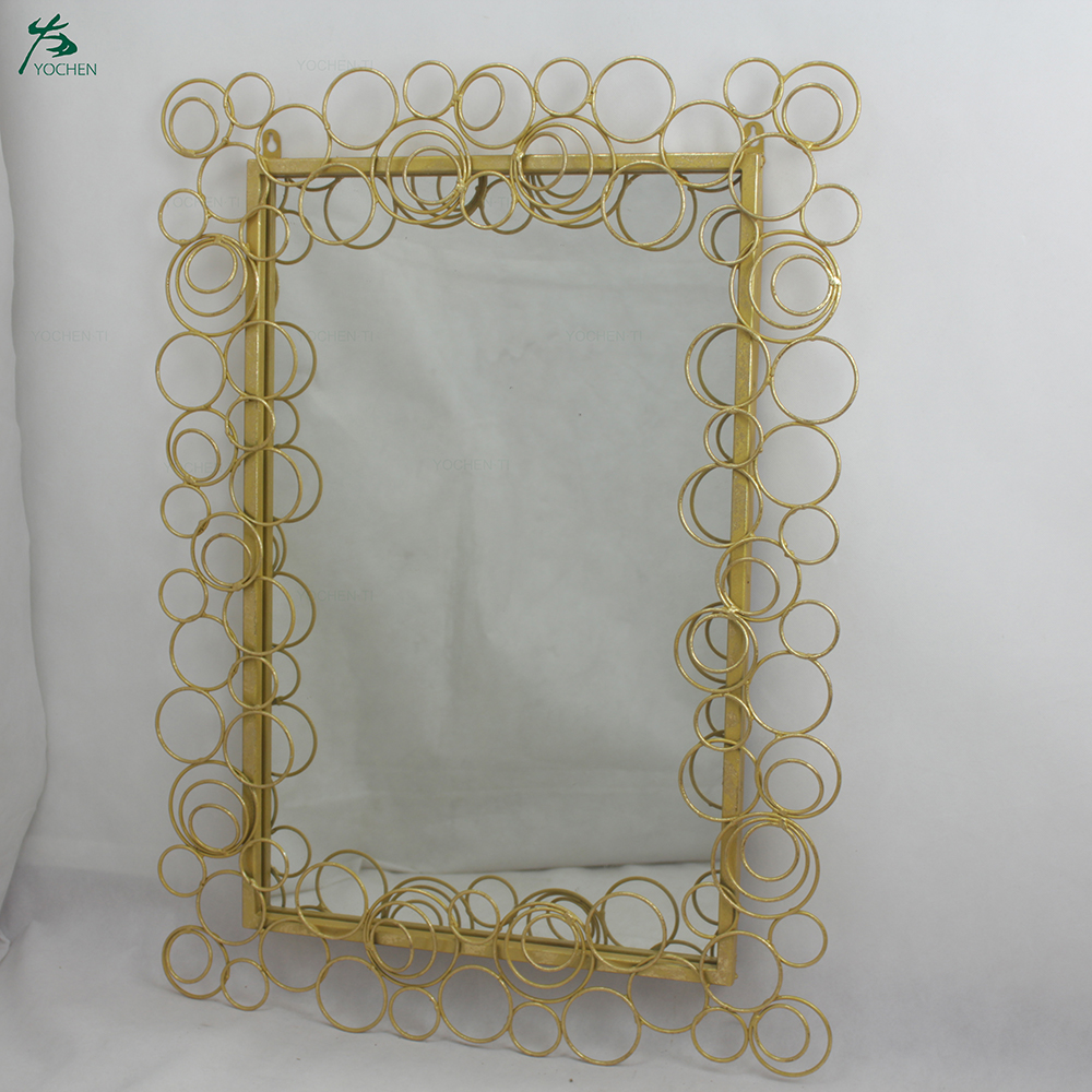 Metal framed decorative wall mirror with black frame