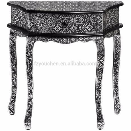Traditional one drawer corner console table embellished with metallic